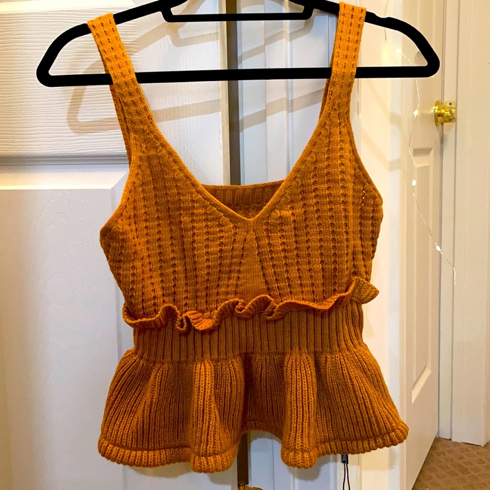 Never been worn before. It is a size small and tags still on.